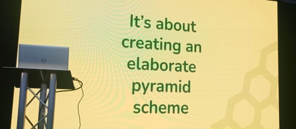 Slide from the Umbraco Manchester team proclaiming 'It's about creating an elaborate pyramid scheme'